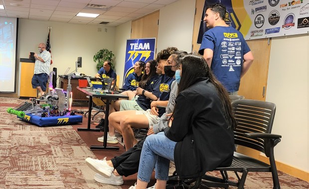 Members of the Crestwood High School Chargers Robotics team participate in a technology fair May 21 at Caroline Kennedy Library in Dearborn Heights. (Sue Suchyta - For MediaNews Group)